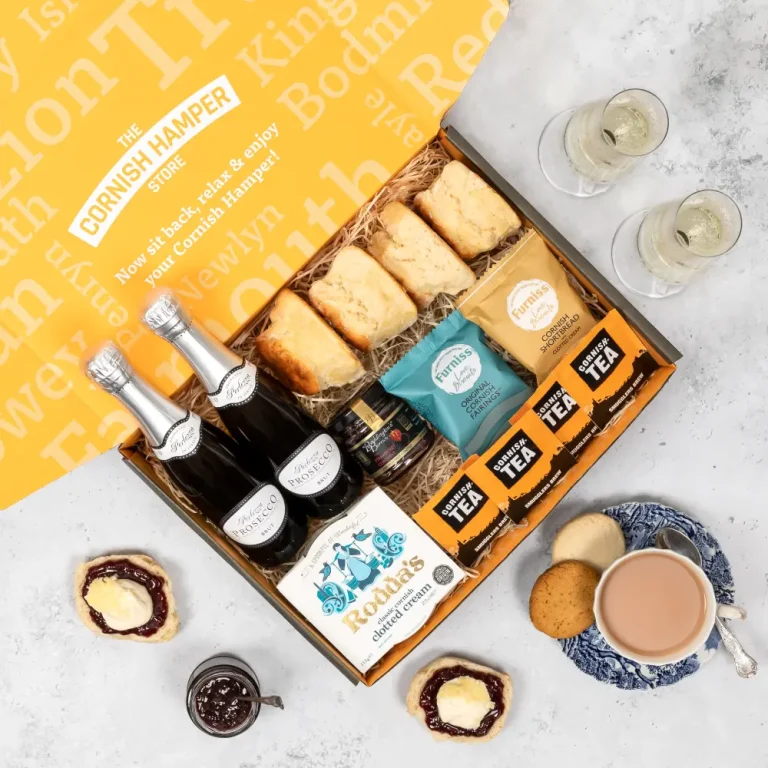 Cornish Cream Tea Gift Hamper with Prosecco, presented on a bed of classic hamper straw