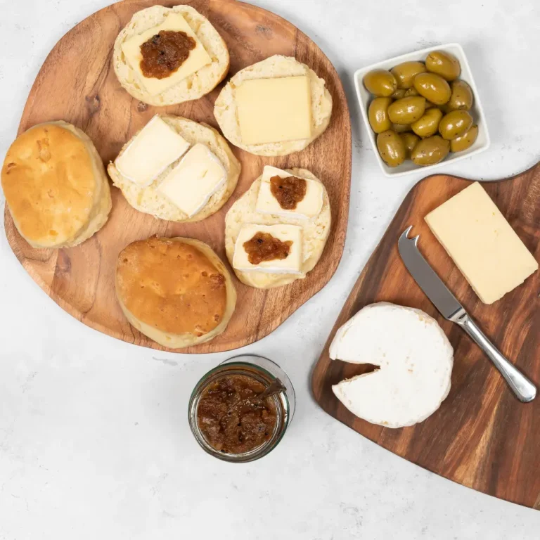 Cheese scones sliced and topped with cornish cheese and spiced apple chutney