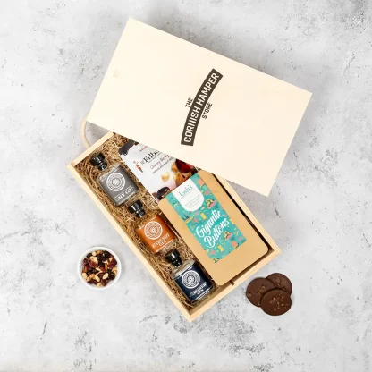 The Rosemullion Gin Gift Set displayed in an opened wooden Cornish Hamper Store branded box
