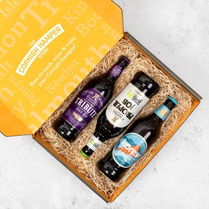 The Cornish Beer Gift Set presented in a hamper store box with a layer of straw