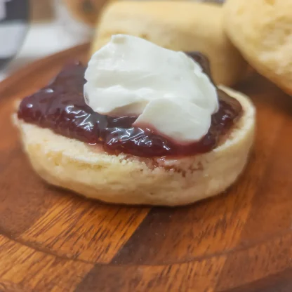 Vegan scone with jam and dairy free oat fraiche