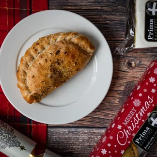 Cocktail Christmas Pasties filled with turkey, stuffing, sausage, bacon and cranberry sauce