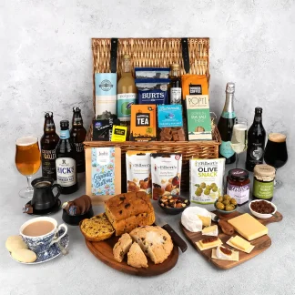 Hamper wicker basket filled with Cornish food and drink