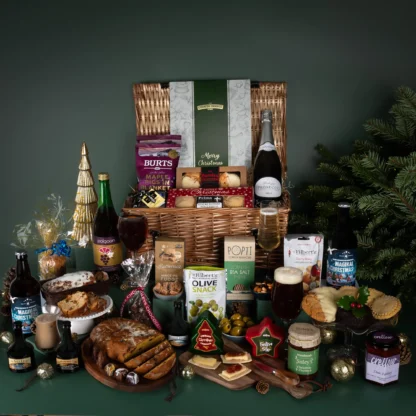 The Holiday Bliss Hamper filled with luxury Cornish food and drink such as Christmas cheeses, chutneys, prosecco and wine