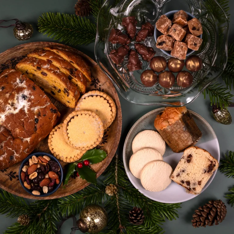 Delicious selection of Christmas sweets and treats in the Cornish Christmas Hamper. Cakes, pies, fudge and chocolate Santas