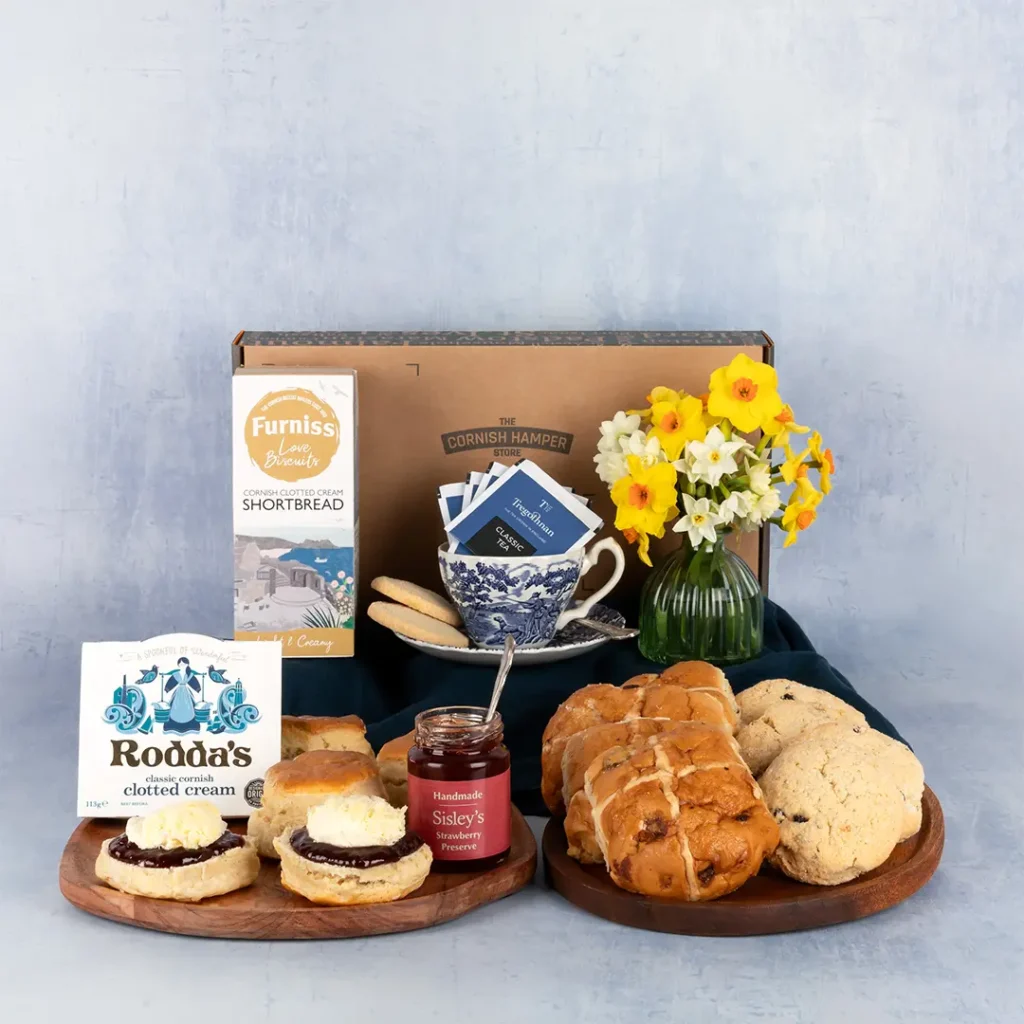 The Easter Cream Tea Hamper packed with Cornish cream teas, hot cross buns, buttery shortbread and traditional hevva buns