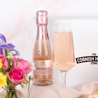 Miniature pink prosecco bottle