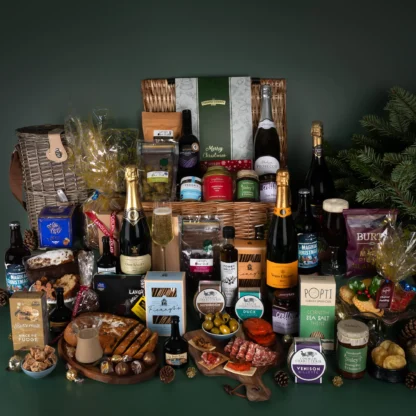 The Royal Christmas Feast Hamper packed with luxurious champagne, cream liqueurs and gourmet sweet and savoury snacks