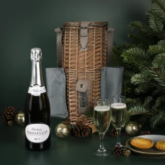 Wine Cooler Gift Set featuring a wicker wine cooler, prosecco glasses, bottle opener and a perfectly chilled bottle of bubbly