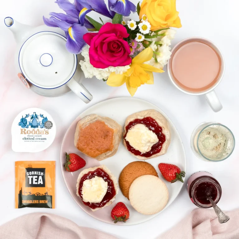 Light and fluffy Cornish scones topped with Sisleys Jam and Roddas Cream
