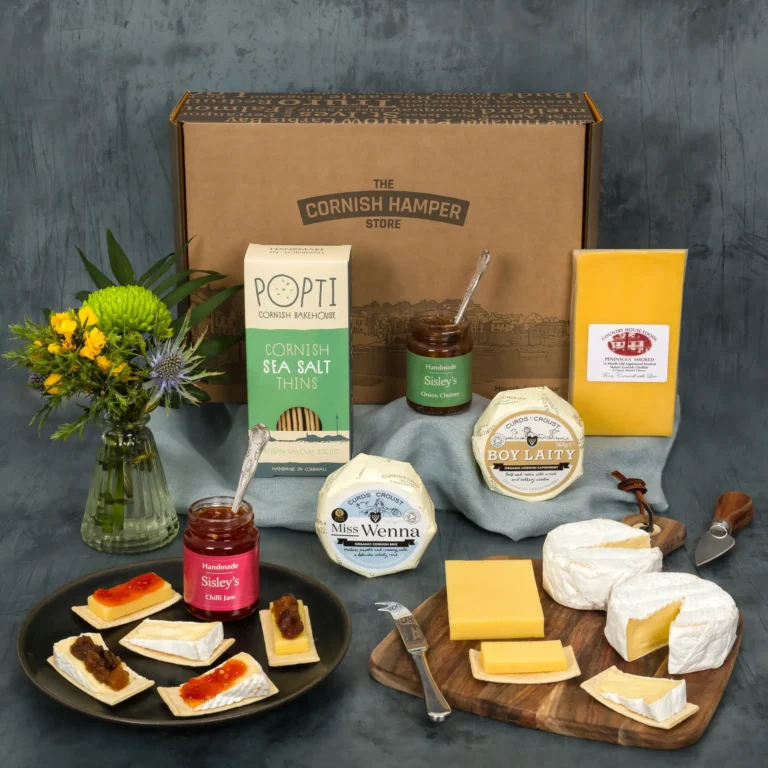 The Birthday Cheese Hamper brimming with luxury cheeses, chilli jam, crackers and chutney