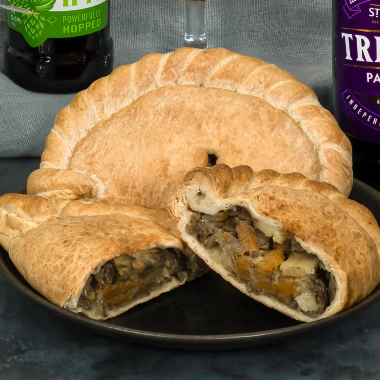 Cornish pasty filled with steak, onion, swede, potato, salt and pepper